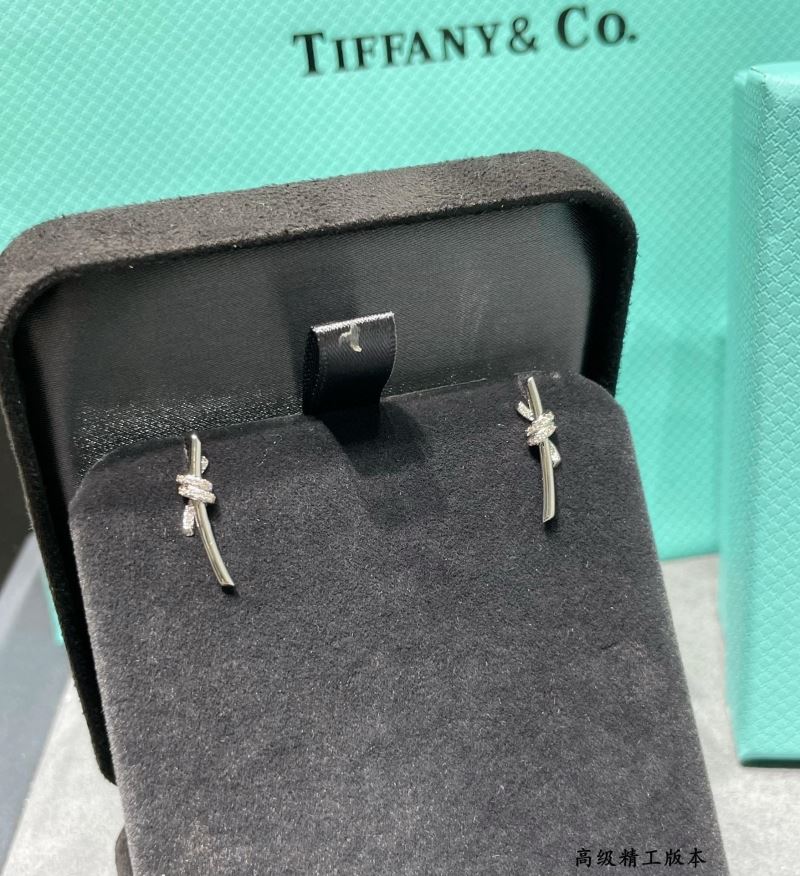 T*f*ny earrings